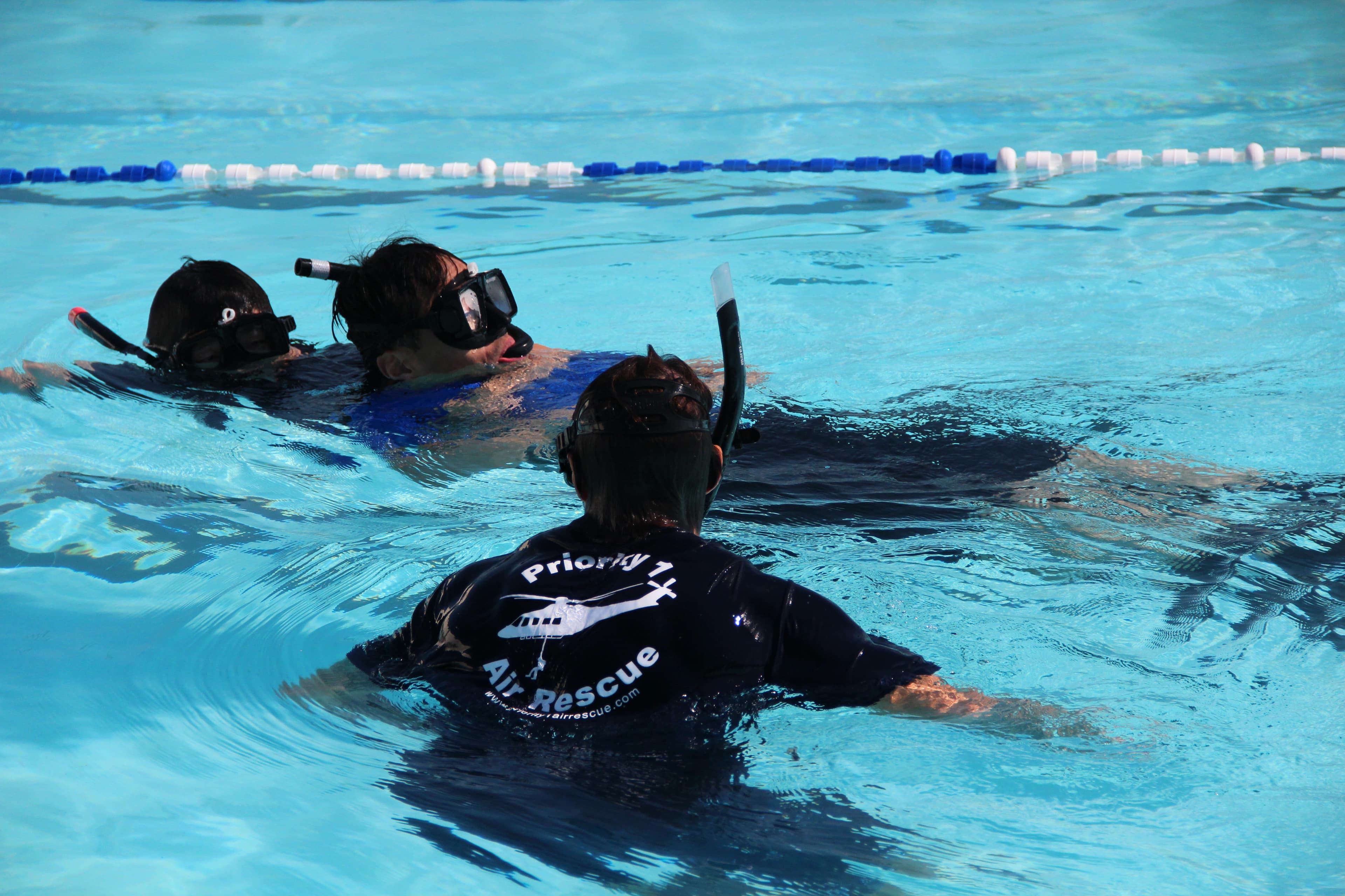 Rescue swimmer with P1AR equipment during water training