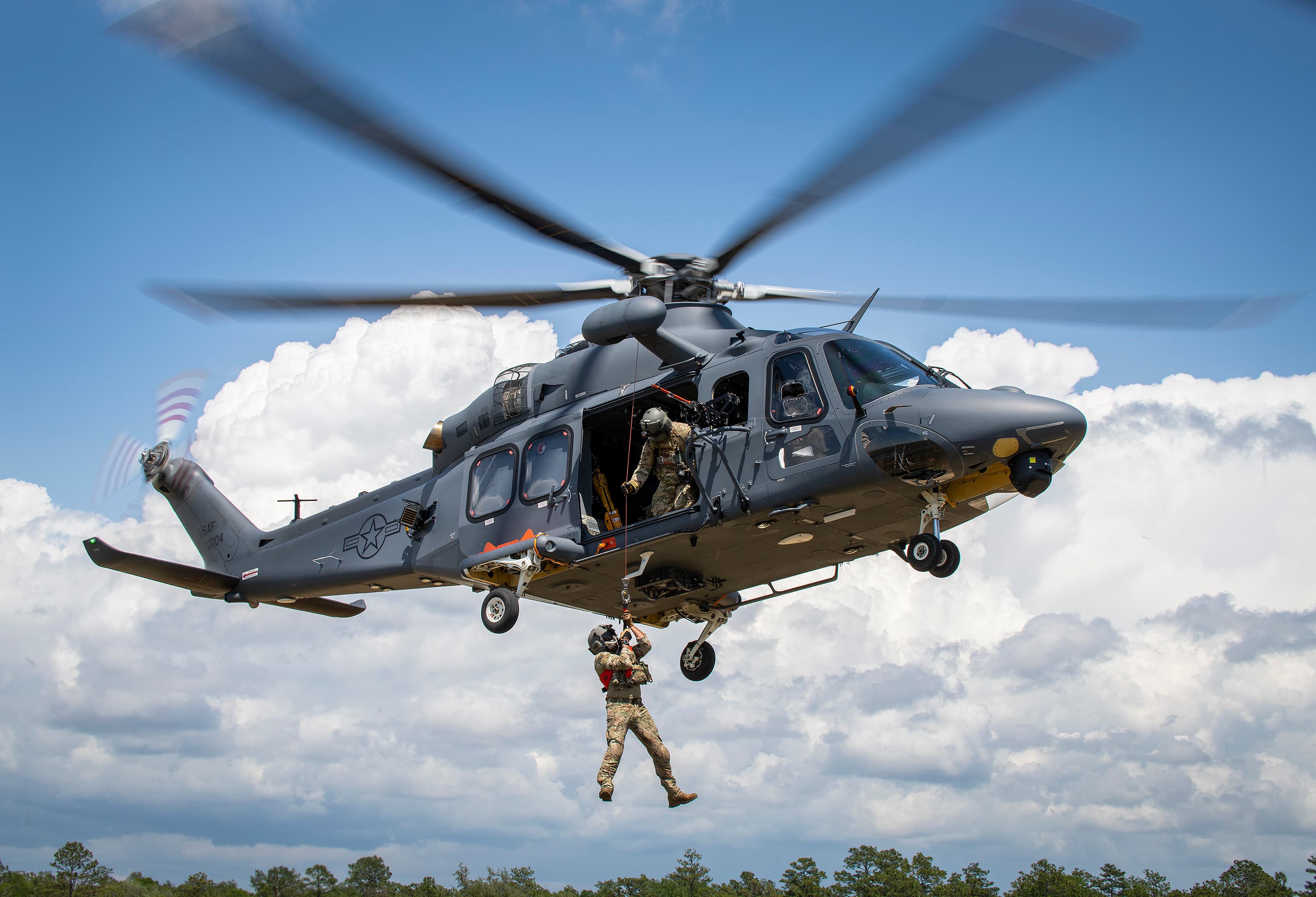 USAF MH-139 Grey Wolf hoist training in flight